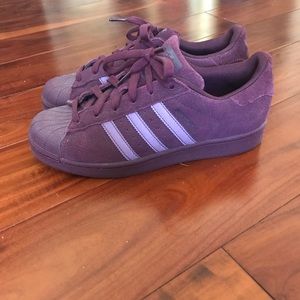 Deep purple adidas superstars.